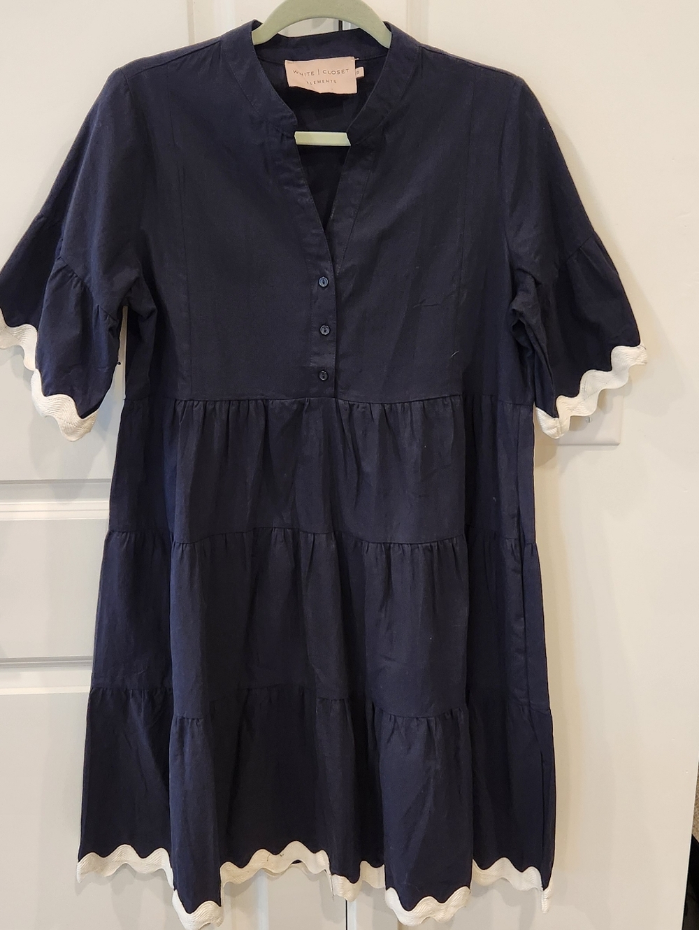 White I Closet Navy Ruffle Hem Mini Dress